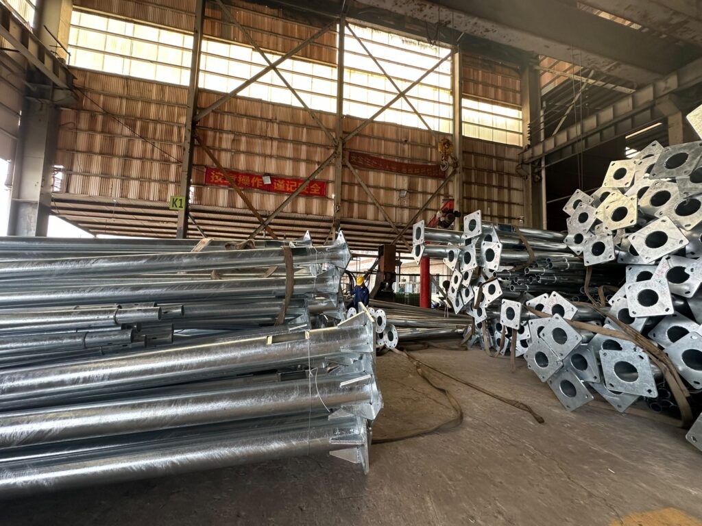 MCL Solar Algeria 10M Steel Poles with Base Flange Gusset Reinforcement for Sahara High Wind Resistance